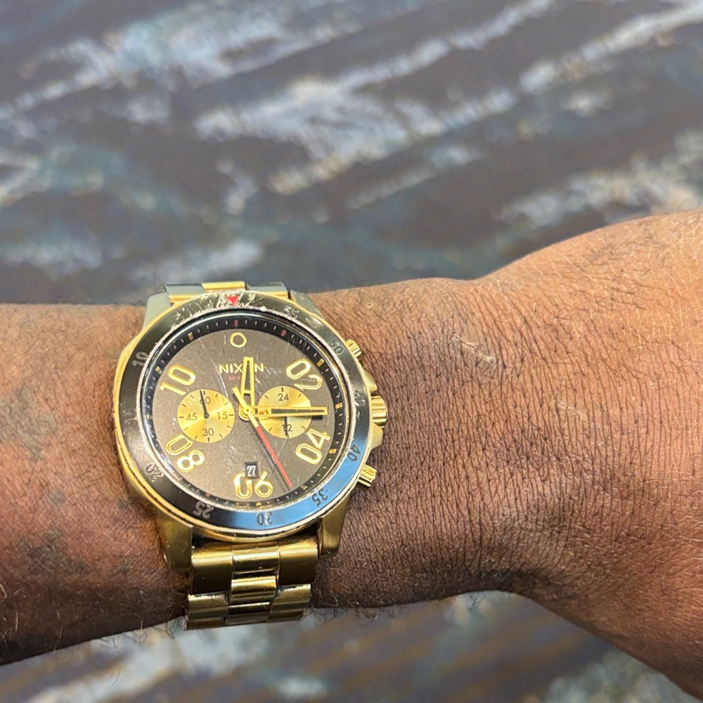 Nixon Gold and Black Chronograph Watch